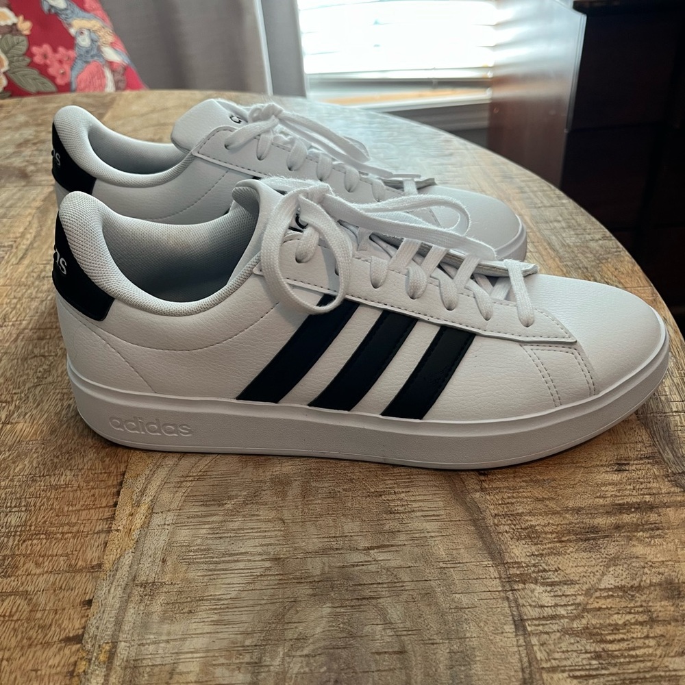 adidas White and Black Sneakers with Classic Design and Bold Stripes